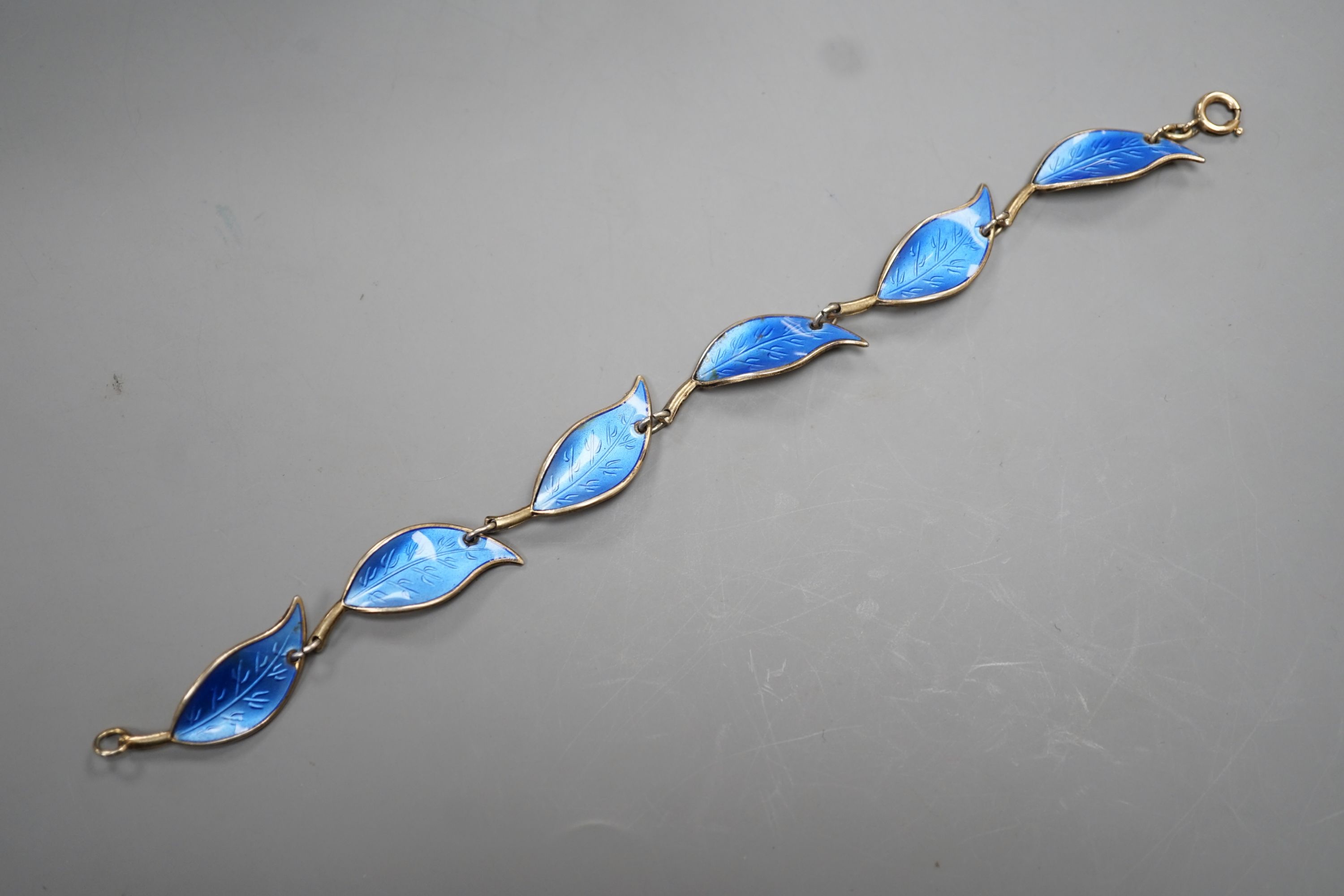 A Norwegian 925 gilt white metal and blue enamel leaf link bracelet by David Andersen, 17cm.